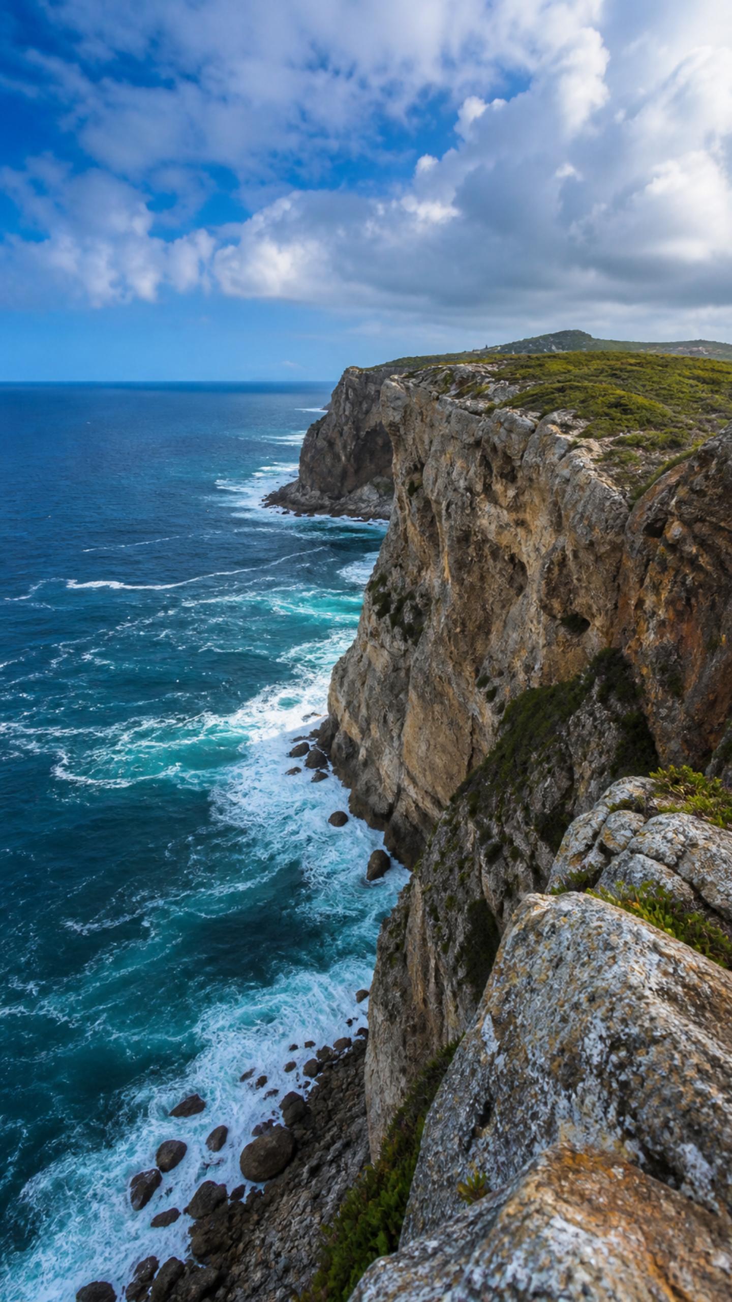 Cliffs Over Blue Waves