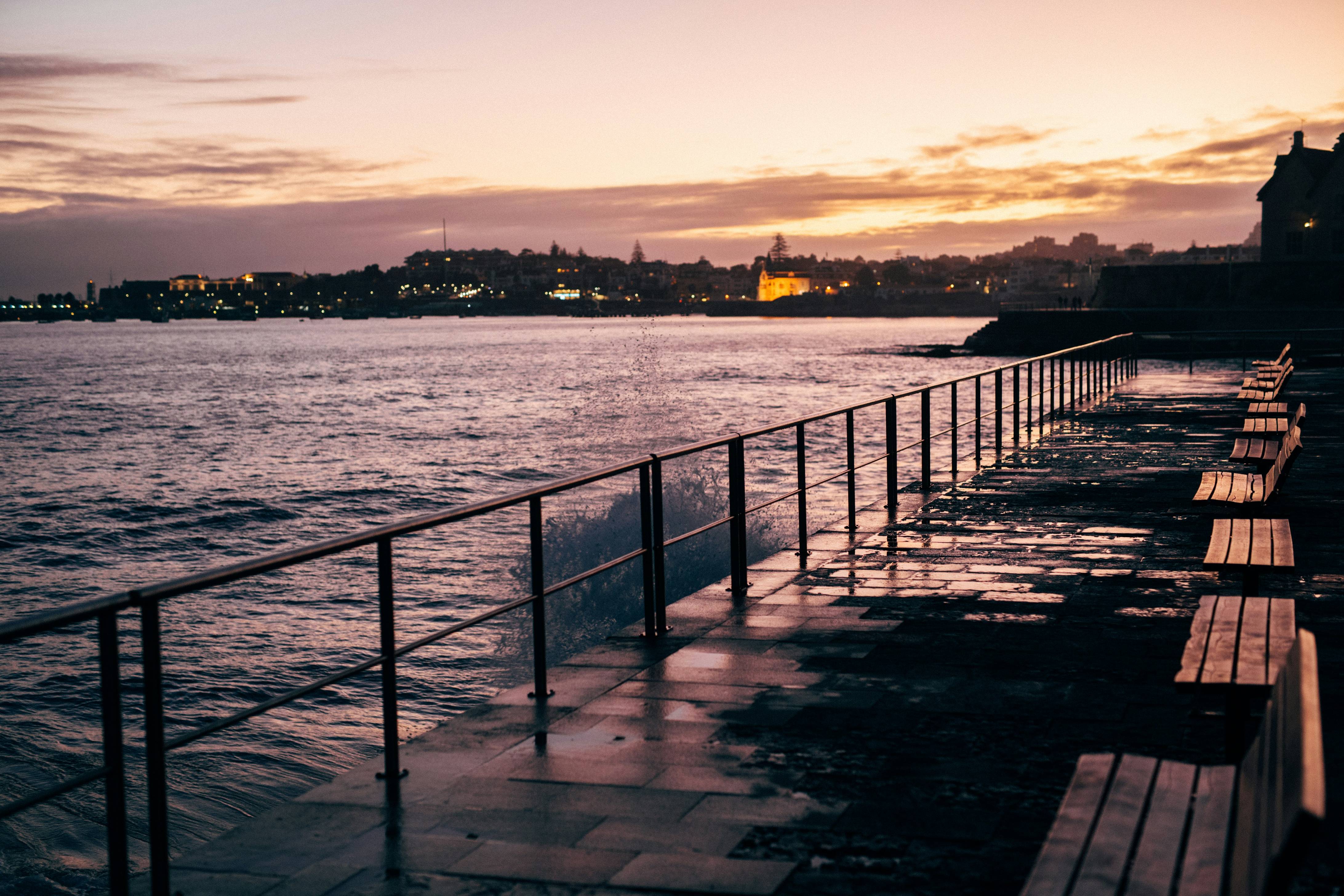 a dock leading to a city