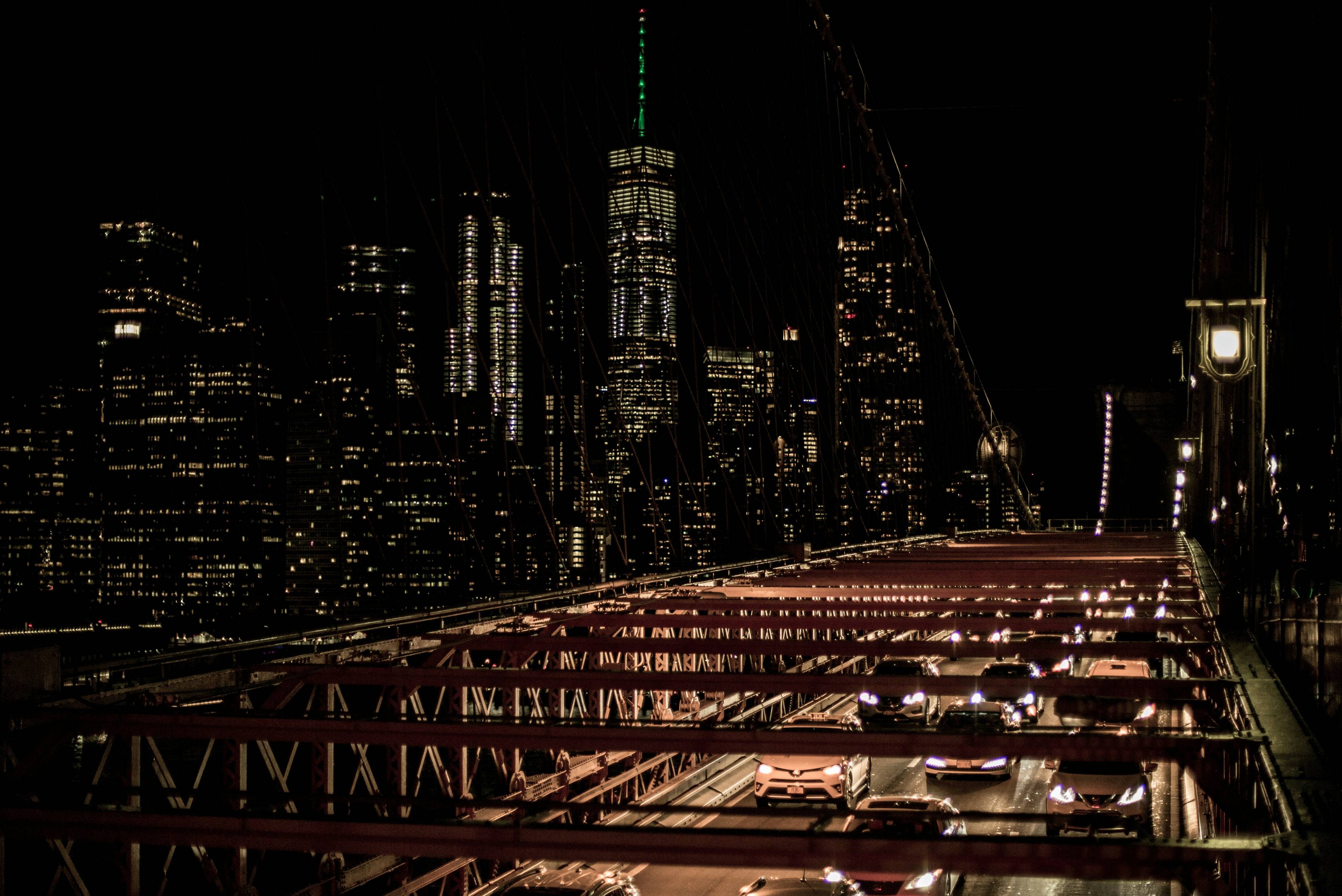 city with high rise buildings during night time