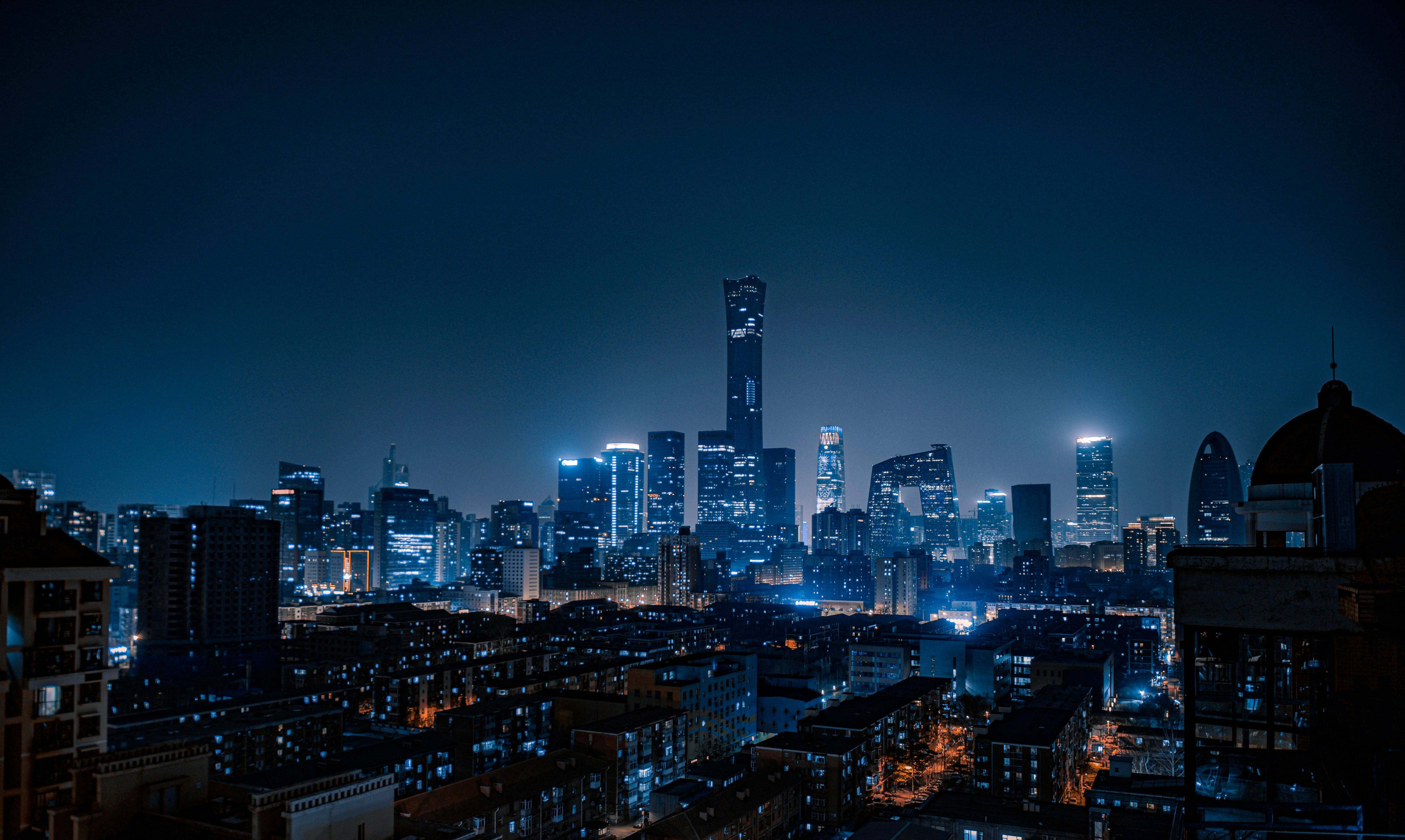 city skyline during night time